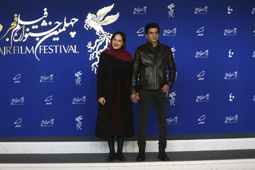 «شیرین اسماعیلی» بازیگر فیلم «۲۸۸۸» به همراه همسرش «مهدی صباغی» در مراسم اکران فیلم در نهمین روز جشنواره فیلم فجر (این دو نفر زن و شوهر هستند) 