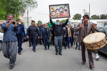 تشییع پیکر مادر شهیدان رضوان مدنی در کرمانشاه