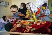 Iran/Ahvaz: Les poupées rendent visite des enfants hospitalisés