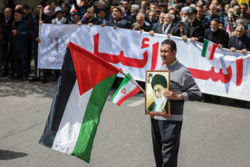 La marche de la Journée mondiale de Qods, s'est tenue ce vendredi 14 avril dans la ville de Zanjan avec la présence de jeûneurs en guise du soutien et de la solidarité au peuple opprimé palestinien opprimé. (Photo : Bahrâm Bayat)