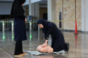 CPR maneuver in subway station