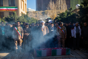 خاکسپاری شهید گمنام در بنیاد ایران شناسی