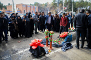 People visit Kerman Martyrs Cemetery after terror attacks