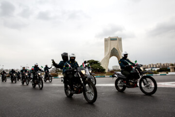 Motorcycle riders with the Iranian Armed Forces parade on Thursday, February 1, 2024 to mark the 45th anniversary of the return from exile of Imam Khomeini, the late founder of the Islamic Republic, ten days before the victory of the Islamic Revolution.