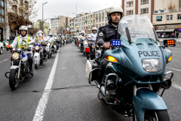 Motorcycle riders with the Iranian Armed Forces parade on Thursday, February 1, 2024 to mark the 45th anniversary of the return from exile of Imam Khomeini, the late founder of the Islamic Republic, ten days before the victory of the Islamic Revolution.