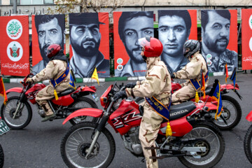 Motorcycle riders with the Iranian Armed Forces parade on Thursday, February 1, 2024 to mark the 45th anniversary of the return from exile of Imam Khomeini, the late founder of the Islamic Republic, ten days before the victory of the Islamic Revolution.