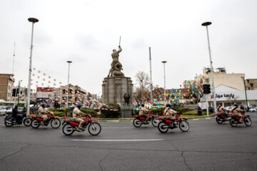 Motorcycle riders with the Iranian Armed Forces parade on Thursday, February 1, 2024 to mark the 45th anniversary of the return from exile of Imam Khomeini, the late founder of the Islamic Republic, ten days before the victory of the Islamic Revolution.