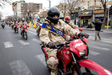 Motorcycle riders with the Iranian Armed Forces parade on Thursday, February 1, 2024 to mark the 45th anniversary of the return from exile of Imam Khomeini, the late founder of the Islamic Republic, ten days before the victory of the Islamic Revolution.