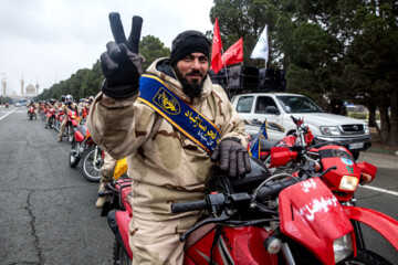 Motorcycle riders with the Iranian Armed Forces parade on Thursday, February 1, 2024 to mark the 45th anniversary of the return from exile of Imam Khomeini, the late founder of the Islamic Republic, ten days before the victory of the Islamic Revolution.