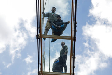 Tourists visiting Iran's largest glass suspension bridge