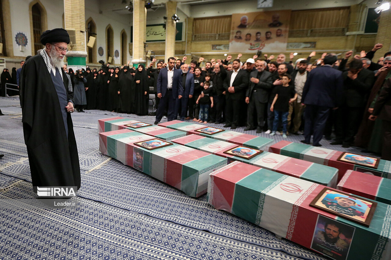 Supreme Leader praying over bodies of seven martyrs Supreme Leader praying over bodies of seven martyrs