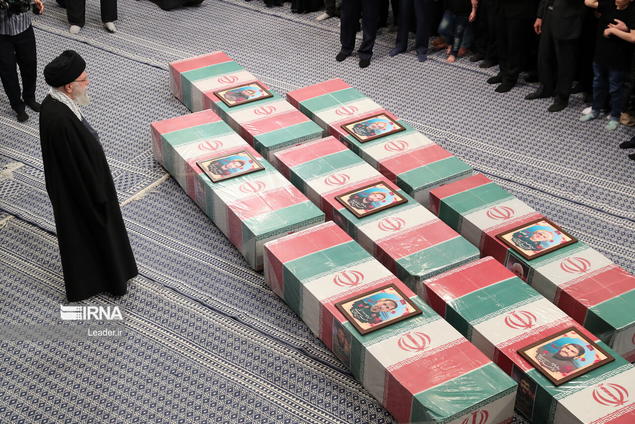 Supreme Leader praying over bodies of seven martyrs Supreme Leader praying over bodies of seven martyrs