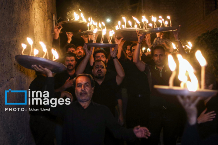 آیین شمع گردانی در روستای بهدان