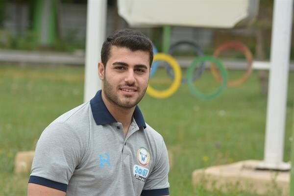Iran's junior weightlifter ranks 4th in world