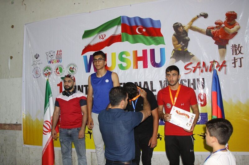 Iran wushu fighters hit Azeri rival