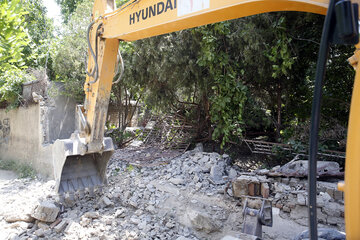 تخریب بناهای غیر مجاز حریم رودخانه کرج