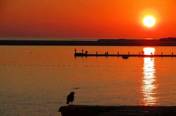 The beautiful aspects of sunrise and sunset in Kish island