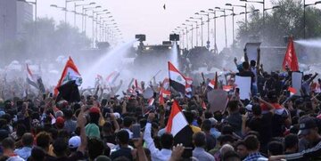 درگیری میان نیروهای امنیتی و تظاهرکنندگان در میدان تحریر بغداد 