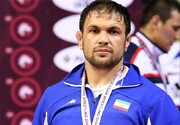 La entrega de la medalla de oro a un luchador iraní, a la espera de la aprobación del Comité Olímpico Internacional