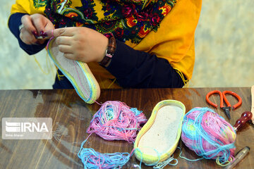 Making traditional shoes “Giveh” in Iran