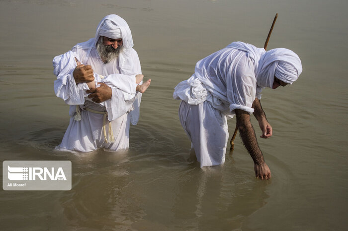 Baptism rite held in Iranian Karoun River