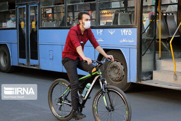 Iranians wearing masks in public places