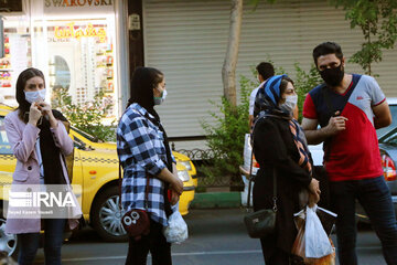 Iranians wearing masks in public places