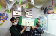 پیکر پاک شهید مدافع حرم در دلیجان به خاک سپرده شد