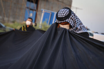 اهتراز پرچم " یا حسین (ع) " در پارک جزیره اهواز