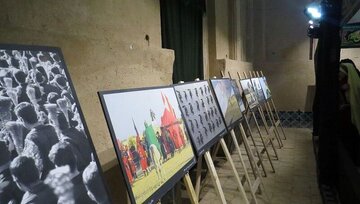 نمایشگاه عکس دفاع مقدس در مهاباد گشایش یافت