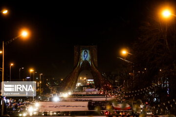 Azadi Tower lit, video mapped by memories of Islamic Revolution