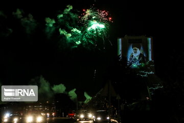 Azadi Tower lit, video mapped by memories of Islamic Revolution