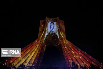 Azadi Tower lit, video mapped by memories of Islamic Revolution