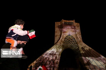 Azadi Tower lit, video mapped by memories of Islamic Revolution