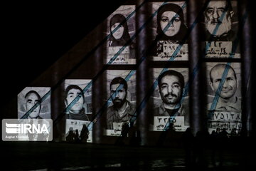 Azadi Tower lit, video mapped by memories of Islamic Revolution