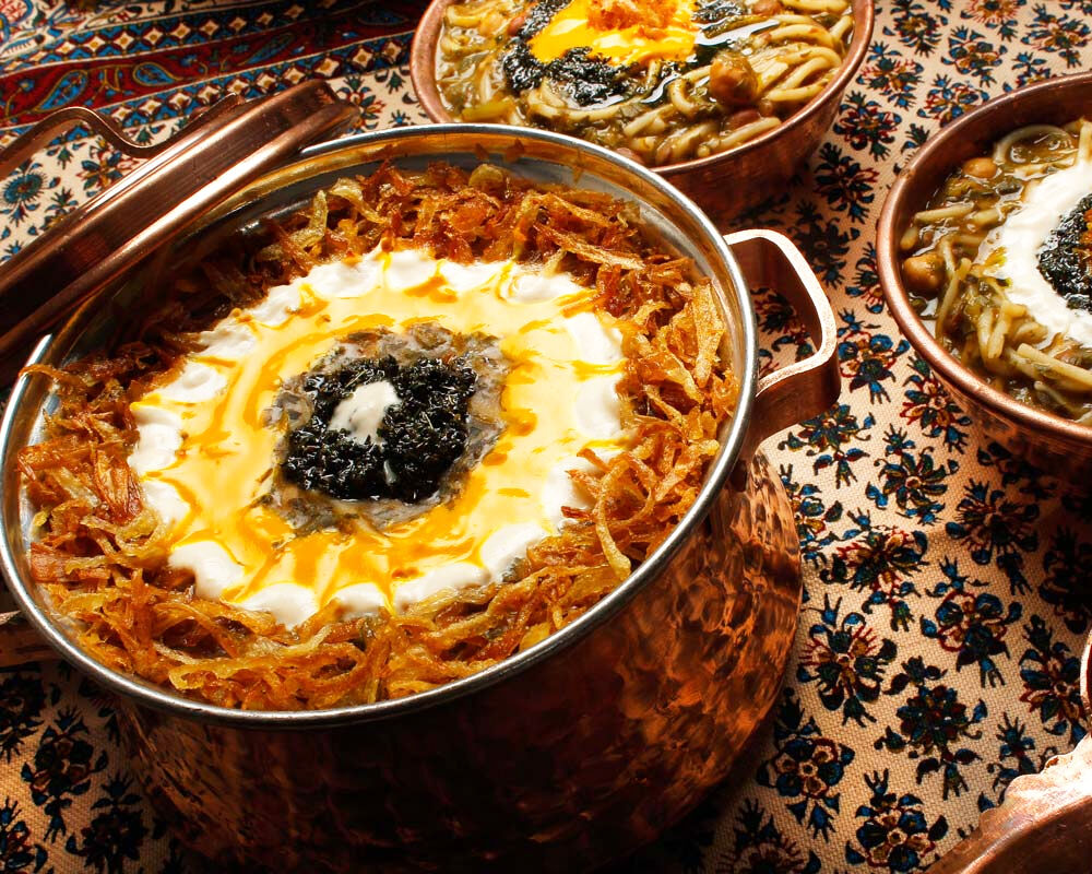 شنبه اول سال در شهربابک، به صرف رشته پلو و آش
