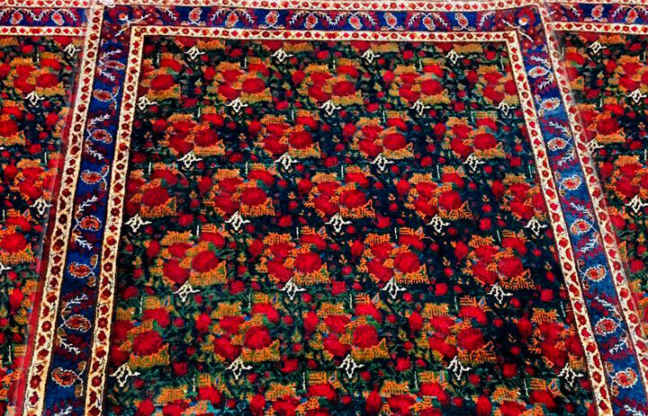 Persian carpet illustrating joyful Iranian garden