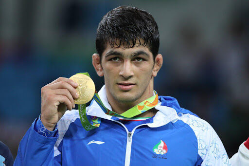 Iran’s wrestling genius gifts his gold medal to families of COVID-19 victims