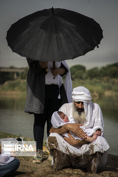 Baptism ceremony in Karoun River; Southwest Iran