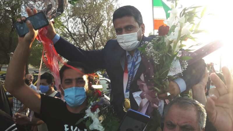 قهرمان المپیک با استقبال مردم وارد زادگاهش دهلران شد