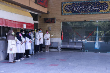 مراسم بدرقه با پیکر علی لندی نوجوان فداکار ایذه‌ای در اصفهان