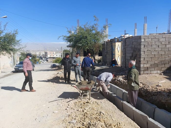 جدول گذاری کوچه های قدیمی و سیل گیر دهدشت آغاز شد