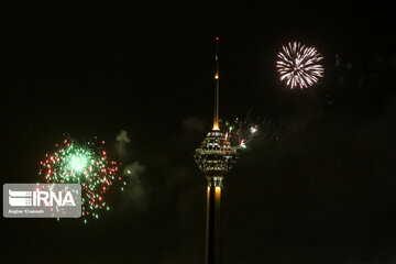 Milad Tower lit with colors to mark Islamic Revolution anniv