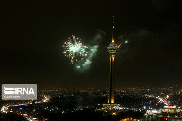 Milad Tower lit with colors to mark Islamic Revolution anniv