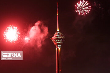 Milad Tower lit with colors to mark Islamic Revolution anniv