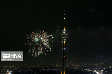 Milad Tower lit with colors to mark Islamic Revolution anniv