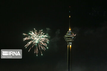 Milad Tower lit with colors to mark Islamic Revolution anniv