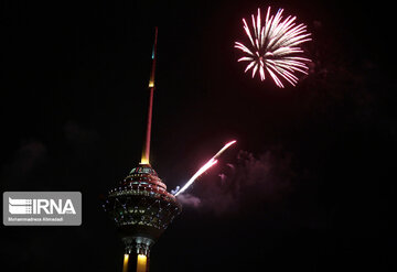 Milad Tower lit with colors to mark Islamic Revolution anniv