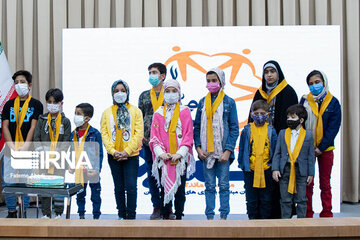 A group of Araki children attending the ceremony of ending treatment organized by a charity that supports children with cancer.