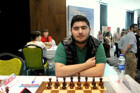 Iranian GM beats world rapid chess champion